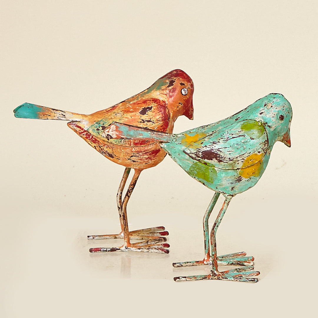 Pájaro de metal en naranja y turquesa efecto vintage