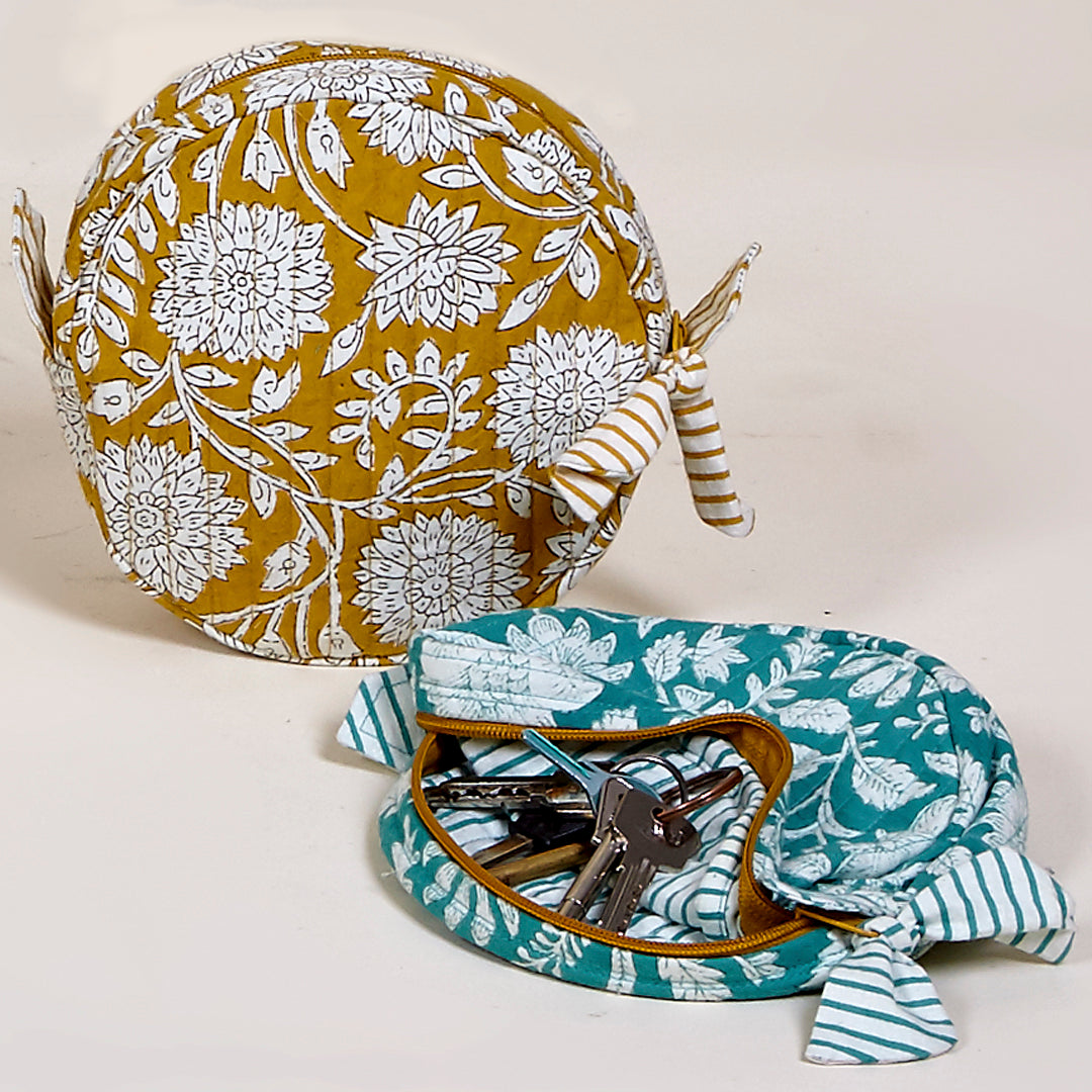 Monedero Rimini flores y rayas de algodón en color turquesa y mostaza