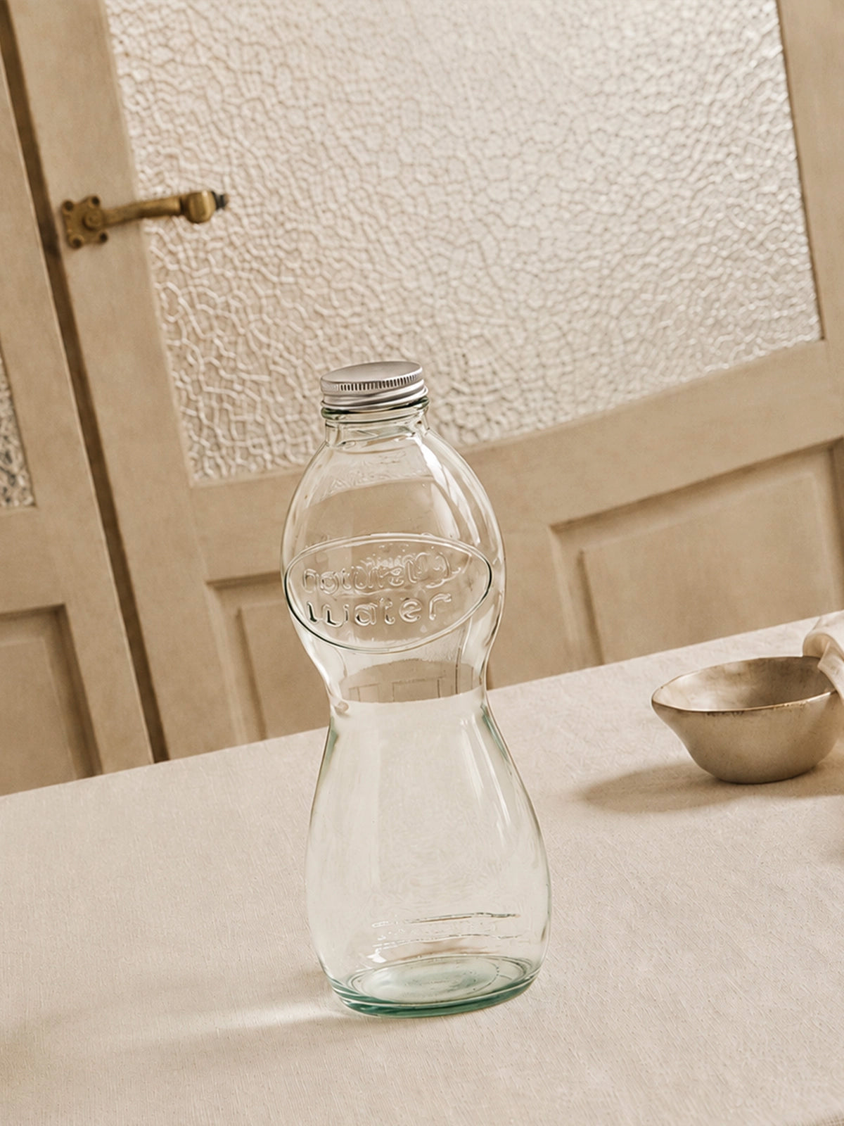 Botella de vidrio reciclado 1L con tapa rosca sin plomo