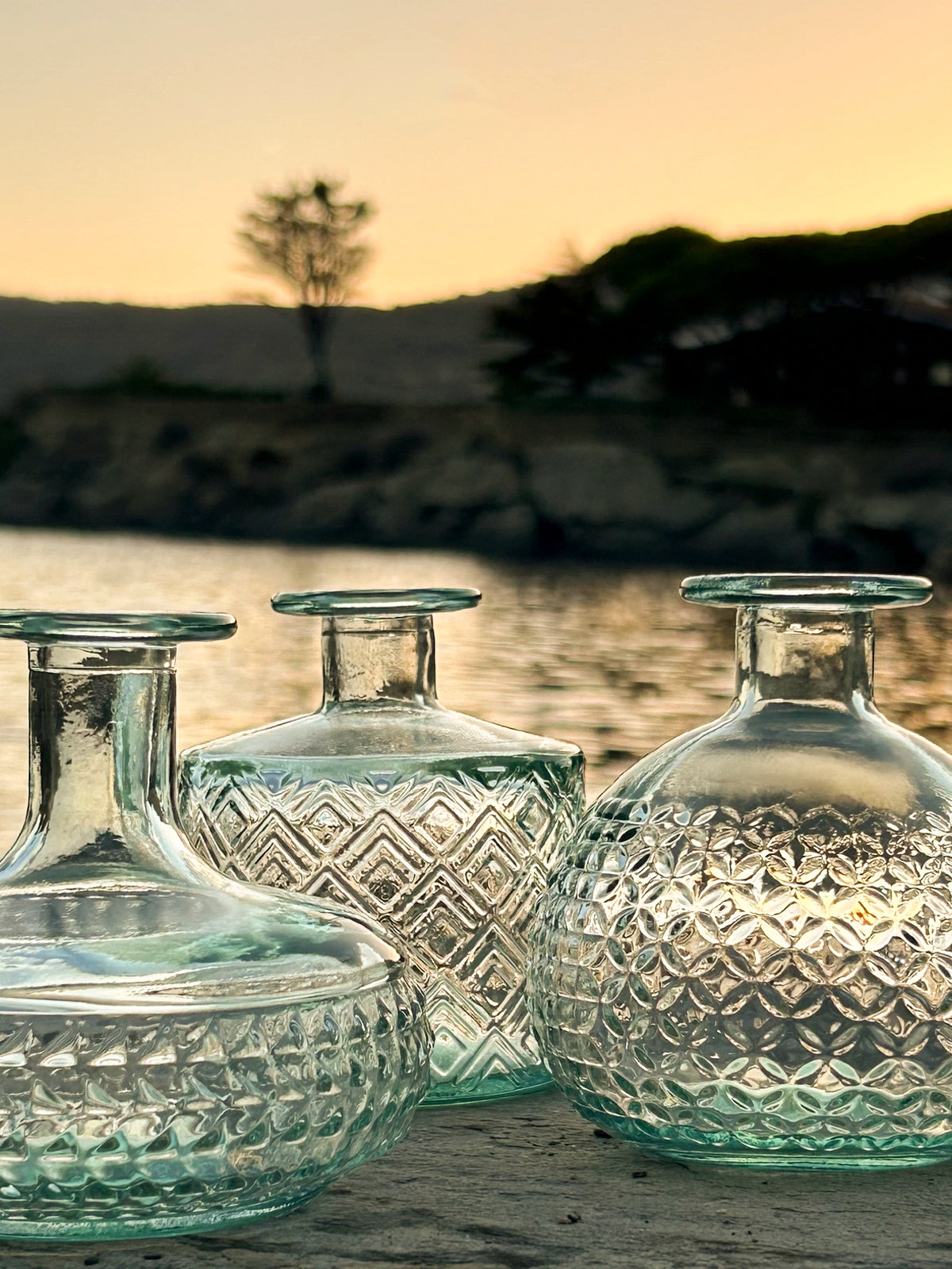 Juego de 3 botellitas Granada transparentes de vidrio reciclado