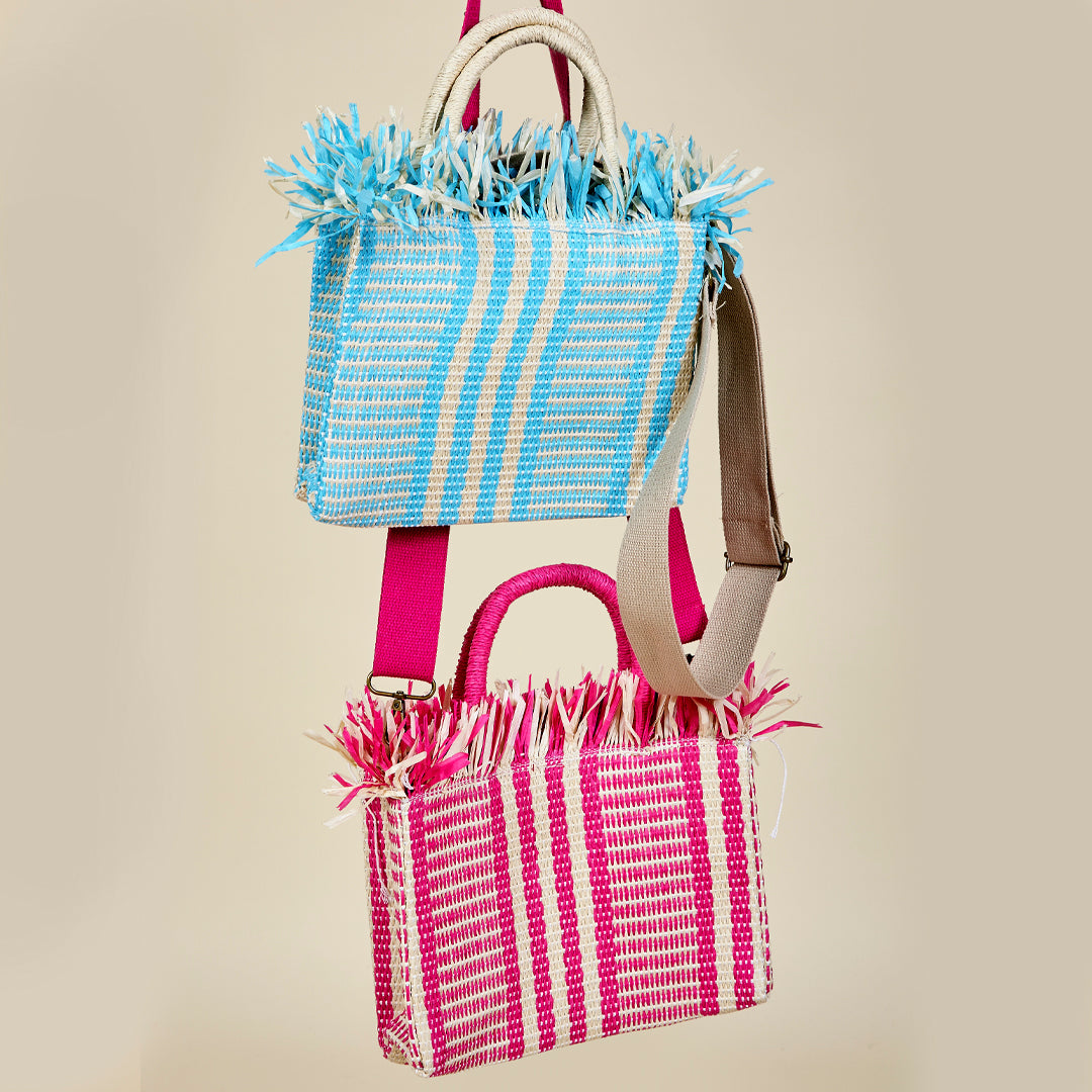 Bolso Cala Rosa de paja de papel con asa regulable en turquesa y rosa